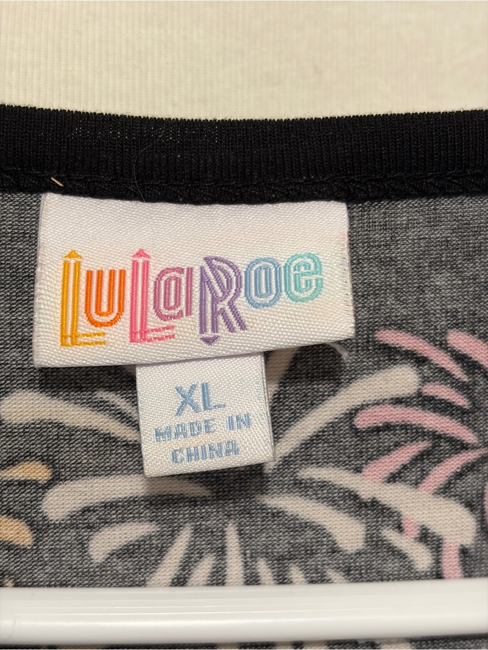 LuLaRoe Black Tunic with Pastel Logo & Firework Print - Picture 2 of 3